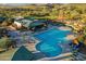 Resort-style pool with expansive deck at 41717 N Harbour Town Way, Anthem, AZ 85086