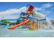 Brightly colored water park with slides at 41717 N Harbour Town Way, Anthem, AZ 85086