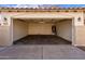 Attached garage with double door entry at 43249 W Jeremy St, Maricopa, AZ 85138