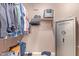 Large closet with shelving and a safe at 44783 W Alamendras St, Maricopa, AZ 85139