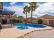 Relaxing kidney shaped pool with spa and brick pavers at 44783 W Alamendras St, Maricopa, AZ 85139