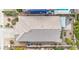 Aerial roof view of a single-Gathering home with desert landscaping in a neighborhood with swimming pools at 4714 E Paso Trl, Phoenix, AZ 85050