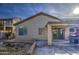 Backyard features a covered patio, grill, and raised garden at 4714 E Paso Trl, Phoenix, AZ 85050