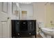 Bathroom with dark vanity, toilet, and bathtub at 4714 E Paso Trl, Phoenix, AZ 85050