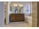 Double vanity bathroom with granite countertop and large mirror at 4714 E Paso Trl, Phoenix, AZ 85050
