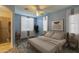 Serene bedroom with large windows, comfortable king size bed, and ensuite bathroom at 4714 E Paso Trl, Phoenix, AZ 85050