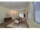 Inviting dining room featuring a stylish table set, neutral color palette, and natural light at 4714 E Paso Trl, Phoenix, AZ 85050