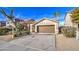 One story house, brown garage door, desert landscaping, and a driveway at 4714 E Paso Trl, Phoenix, AZ 85050