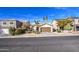 Single-story house with brown garage door and xeriscaped front yard at 4714 E Paso Trl, Phoenix, AZ 85050