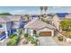 Charming home features a desert landscaped front yard and two-car garage in a residential neighborhood at 4714 E Paso Trl, Phoenix, AZ 85050