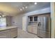 Kitchen with island and pantry at 4714 E Paso Trl, Phoenix, AZ 85050