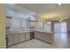 Kitchen with light wood cabinets and track lighting at 4714 E Paso Trl, Phoenix, AZ 85050