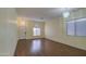 Bright living room with hardwood floors and a chandelier at 4714 E Paso Trl, Phoenix, AZ 85050