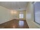 Spacious living room featuring hardwood floors and neutral walls at 4714 E Paso Trl, Phoenix, AZ 85050
