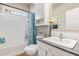 Clean bathroom with shower/tub and a window at 5201 W Camelback Rd # F316, Phoenix, AZ 85031