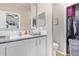 Bright bathroom with white cabinets and a toilet at 5201 W Camelback Rd # F316, Phoenix, AZ 85031