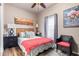 Charming bedroom with a comfortable bed and window at 5201 W Camelback Rd # F316, Phoenix, AZ 85031