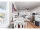 Charming dining room with table, chairs, and natural light at 5201 W Camelback Rd # F316, Phoenix, AZ 85031