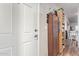 Inviting entryway with coat closet and view into the home at 5201 W Camelback Rd # F316, Phoenix, AZ 85031