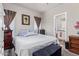 Large main bedroom with king-size bed and ensuite bathroom at 5201 W Camelback Rd # F316, Phoenix, AZ 85031