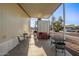 Covered patio with seating area and storage shed at 5201 W Camelback Rd # F316, Phoenix, AZ 85031
