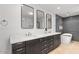 Elegant bathroom with double vanity and large mirrors at 6550 N 7Th St, Phoenix, AZ 85014