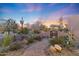 Landscaped walkway to the home with desert plants at 6931 E Stevens Rd, Cave Creek, AZ 85331