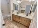 Bathroom with double vanity and a large mirror at 741 N Tower Pl, Chandler, AZ 85225