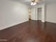 Bedroom with hardwood floors and access to a bathroom at 741 N Tower Pl, Chandler, AZ 85225