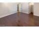 Spacious bedroom with wood floors and walk-in closet at 741 N Tower Pl, Chandler, AZ 85225