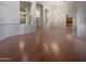 Bright dining room with hardwood floors and view to kitchen at 741 N Tower Pl, Chandler, AZ 85225