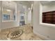Elegant entryway with tile flooring and views into the living areas at 741 N Tower Pl, Chandler, AZ 85225