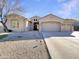 Beautiful home with a three-car garage and nicely landscaped yard at 741 N Tower Pl, Chandler, AZ 85225