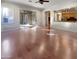 Gathering room with hardwood floors, kitchen views, and patio access at 741 N Tower Pl, Chandler, AZ 85225