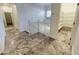 Upstairs hallway with tiled floors and built-in shelving at 741 N Tower Pl, Chandler, AZ 85225