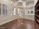 Bright home office with hardwood floors and built-in shelving at 741 N Tower Pl, Chandler, AZ 85225