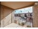 Balcony view overlooking the community pool and surrounding buildings at 7436 E Chaparral Rd # B260, Scottsdale, AZ 85250