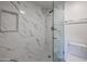 Condo bathroom with marble shower and modern fixtures at 7436 E Chaparral Rd # B260, Scottsdale, AZ 85250