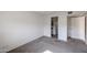 Condo bedroom with carpeted floors and ample space at 7436 E Chaparral Rd # B260, Scottsdale, AZ 85250