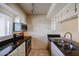 Condo kitchen with stainless steel appliances and granite counters at 7436 E Chaparral Rd # B260, Scottsdale, AZ 85250