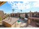 Community pool and patio area with ample seating and shade at 7436 E Chaparral Rd # B260, Scottsdale, AZ 85250