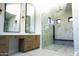 Spa-like bathroom featuring a large shower, double vanity, and marble tile at 8110 E Saddle Horn Rd, Scottsdale, AZ 85255