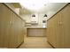 Modern kitchen with light wood cabinets and quartz countertops at 8110 E Saddle Horn Rd, Scottsdale, AZ 85255