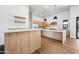 Modern kitchen featuring a marble countertop island and stainless steel appliances at 8110 E Saddle Horn Rd, Scottsdale, AZ 85255