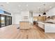 Spacious living area with an open floor plan that showcases hardwood floors and an eat-in kitchen at 8110 E Saddle Horn Rd, Scottsdale, AZ 85255