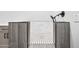 Modern pet washing station features black and white mosaic tiled floors and a shower wand at 8110 E Saddle Horn Rd, Scottsdale, AZ 85255