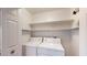 Laundry room with washer, dryer, and ample shelving at 9253 N Firebrick Dr # 241, Fountain Hills, AZ 85268