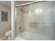 Bathroom with tub/shower combo and glass enclosure at 10027 W Concord Ave, Sun City, AZ 85351