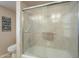 Bathroom with tub/shower combo and glass enclosure at 10027 W Concord Ave, Sun City, AZ 85351