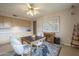 Bright kitchen with ample cabinetry and a breakfast nook at 10027 W Concord Ave, Sun City, AZ 85351